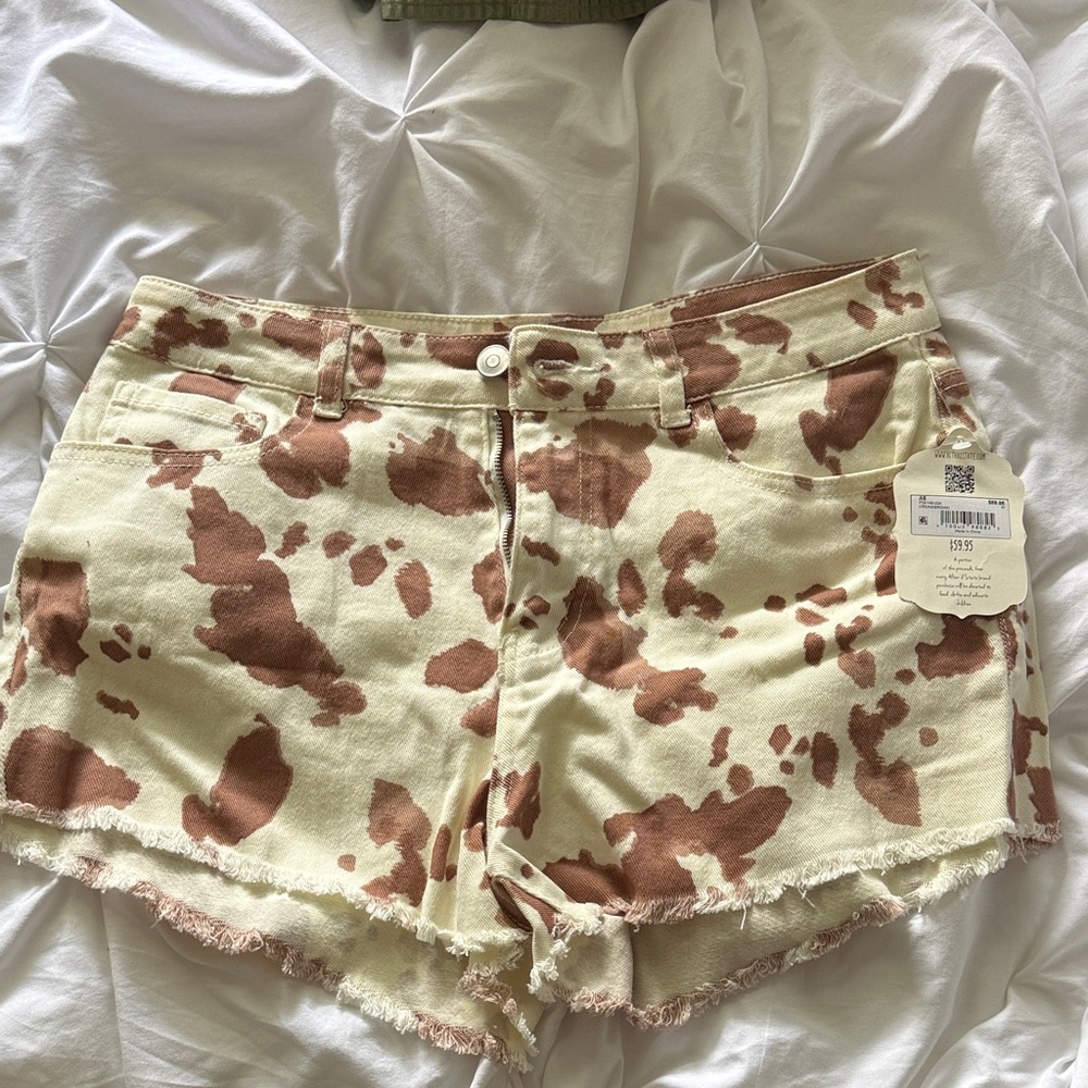 Altar'd State Brown and Cream Cow Print Jean Shorts